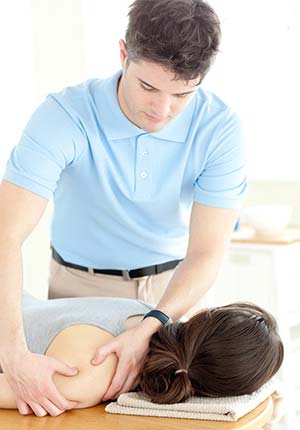 Physical Therapist engaged in treatment of a patient